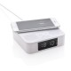 Modern wireless speaker with integrated wireless charging pad and alarm clock function